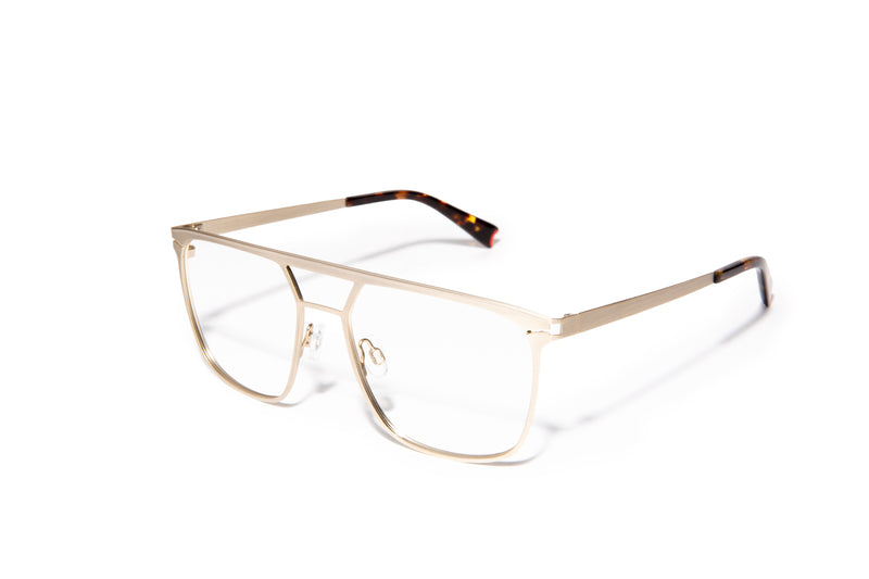 Image of Cheeterz Club eyewear. Photo of square eyeglasses with clear lenses and blue light blocking technology. The frames are medium width with a navigator shape and a gold color, suitable for square, oval, and round face shapes. These glasses can be used as reading glasses with blue light glasses.