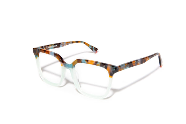 Image of Cheeterz Club eyewear. Photo of square eyeglasses with clear lenses and blue light blocking technology. The frames are medium width with a multi print of a light aqua lower frame and a marble upper frame with colors of golden browns and various shares of aqua/ teal. Suitable for round, oval, and heart shaped face shapes. These glasses can be used as reading glasses with blue light glasses.