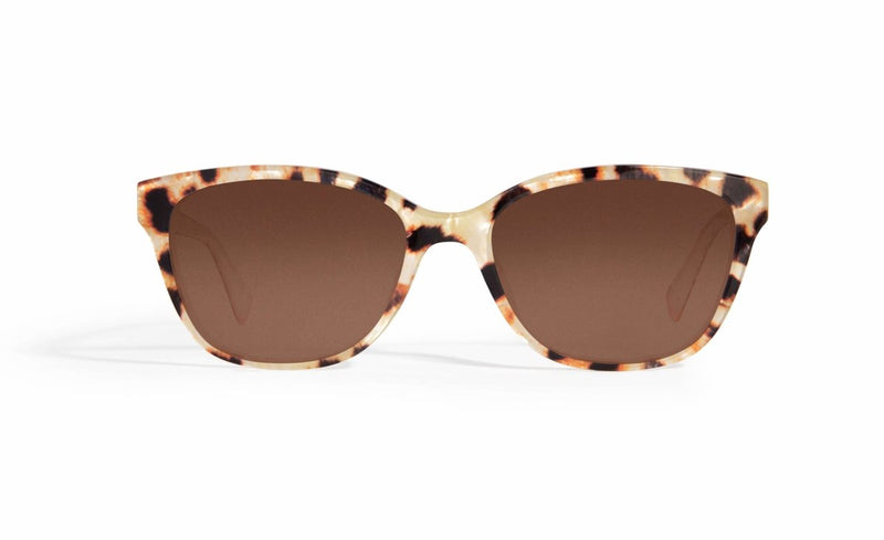 Image of Cheeterz Club eyewear. Photo of rectangle sunglasses with brown tinted lenses.  The frames are small width with tan and brown color and cat print. Suitable for round, oval, and heart shaped face shapes. 
