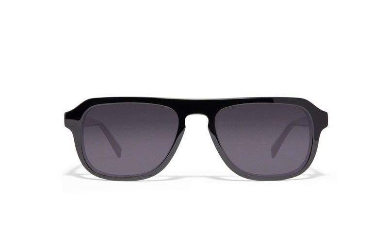 Image of Cheeterz Club eyewear. Photo of retro rectangle sunglasses with gray tinted lenses. The frames are medium width and black color. Suitable for round, oval, and oblong face shapes. 