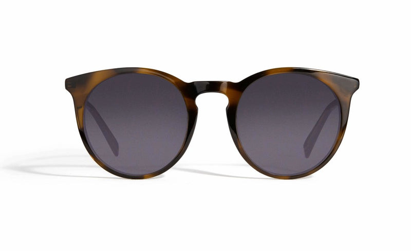 Image of Cheeterz Club eyewear. Photo of retro classic round sunglasses with gray tinted lenses. The frames are medium width and light and dark brown color. Suitable for square, oval, and oblong shaped face shapes. 