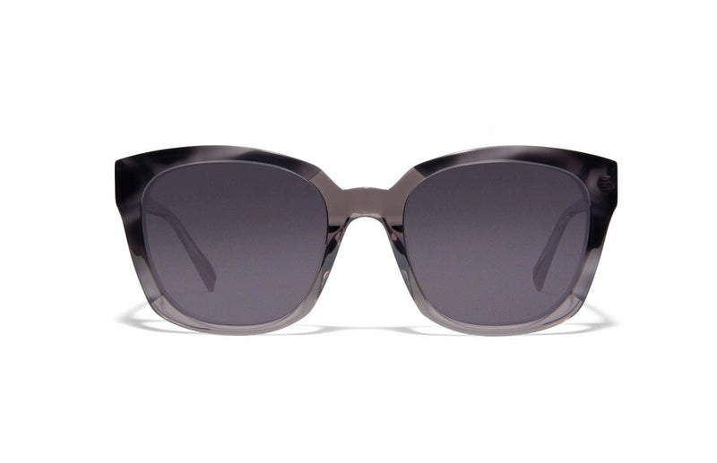 Image of Cheeterz Club eyewear. Photo of square sunglasses with gray tinted lenses. The frames are wide width and custom laminated colors of black, gray, and silver with gray bottoms. Suitable for round, oval, and heart shaped face shapes. 